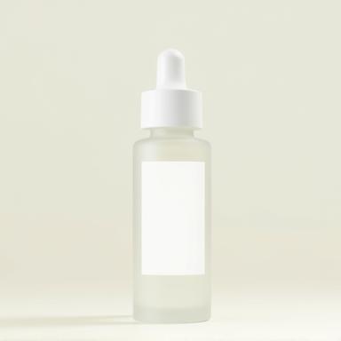 Close-up of an organic serum bottle.